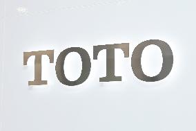 TOTO sign and logo